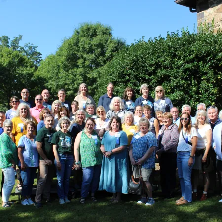 a group of people posing for a photo