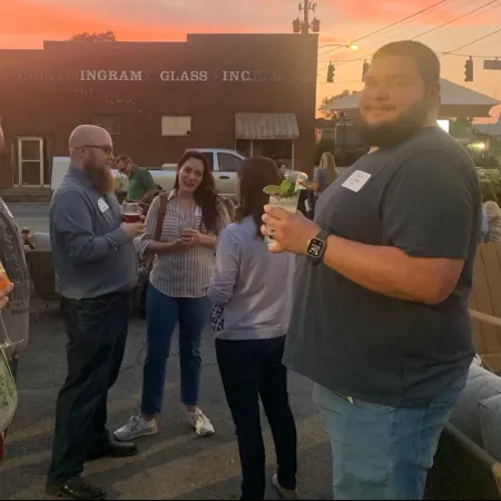 a group of people standing outside