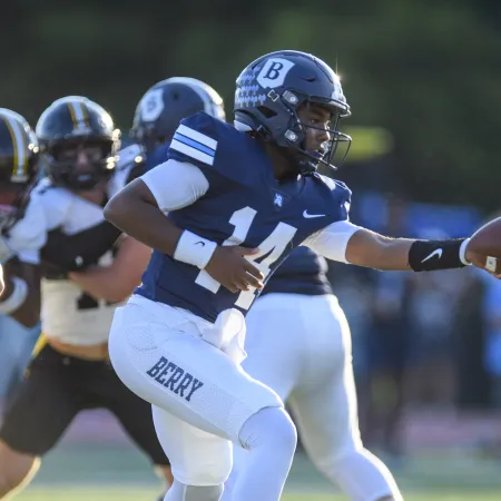 a football player running with the ball