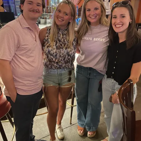 a group of people posing for a photo