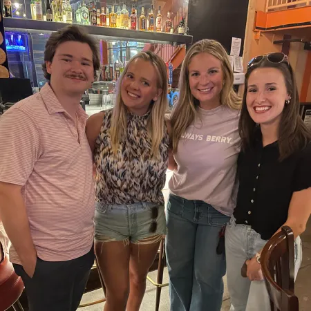 a group of people posing for a photo