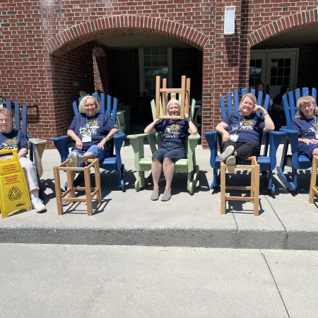 a group of people sitting in chairs