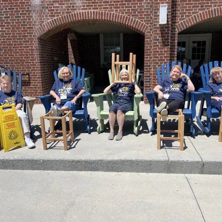 a group of people sitting in chairs