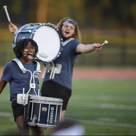 a group of women playing drums