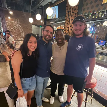 a group of people posing for the camera