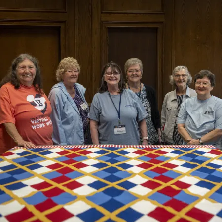 a group of women posing for a photo