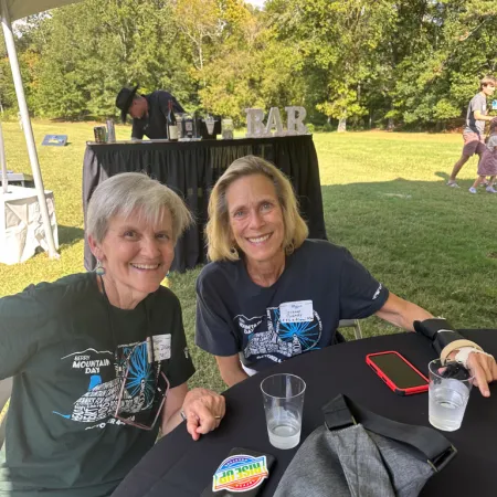 Sonja Davies, Suzanne Gandy are posing for a picture