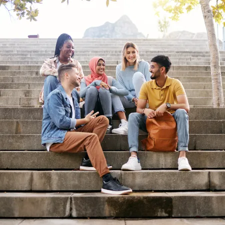 a group of people sitting on steps