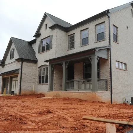 a house with a lot of dirt in front of it