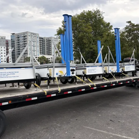 a large truck with a blue rocket on the back