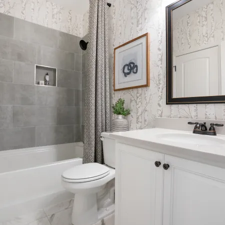 a kitchen with a sink and a shower