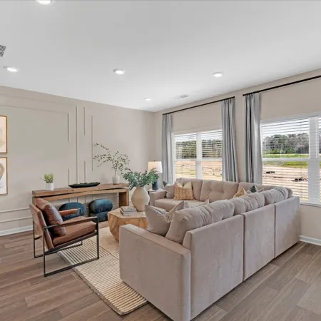 a living room with a couch and a table