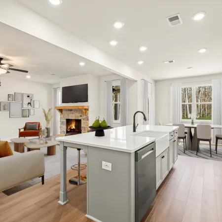 a kitchen with a fireplace and a couch