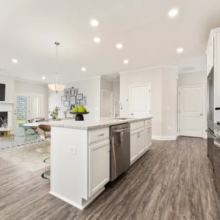 a kitchen with white cabinets
