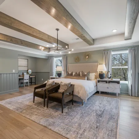 a large bedroom with a large bed