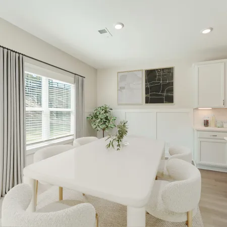 a kitchen with a dining table