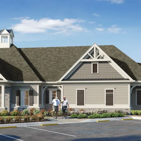 Single-story modern gray house with white trim and pitched roof surrounded by parked cars and people outdoors