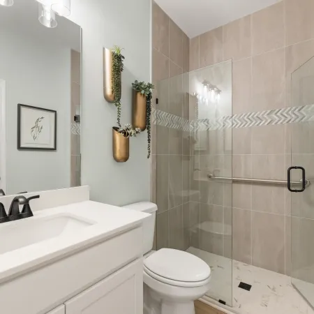 a bathroom with a glass shower