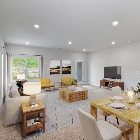 Bright open living and dining area with modern furniture, neutral tones, yellow chairs, patterned rug, and wooden dining table.