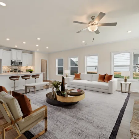 a large living room with a fireplace