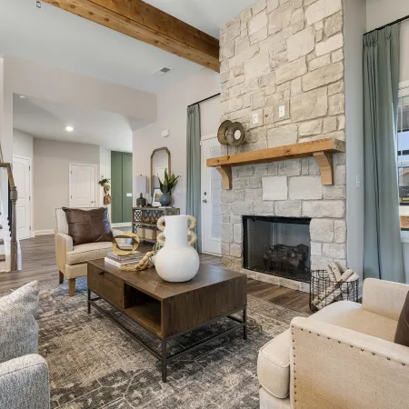 a living room with a fireplace