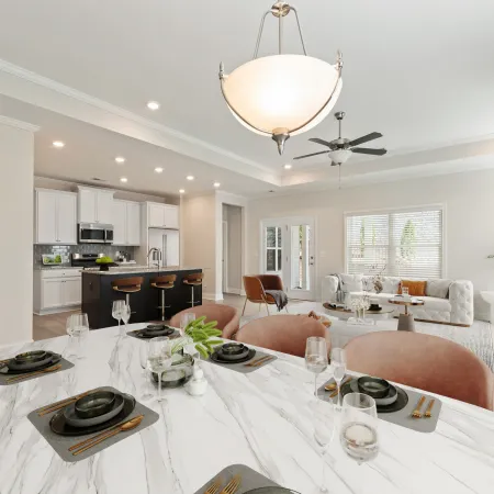 a dining room with a chandelier and a table set for a meal