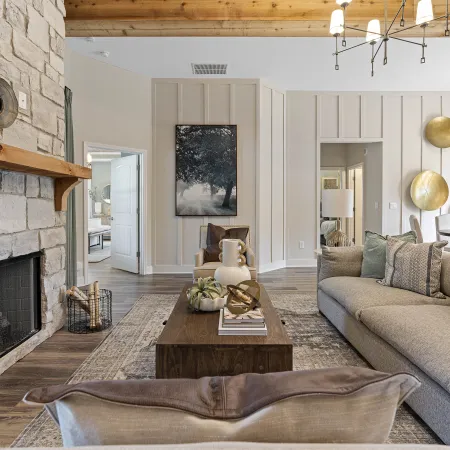 a living room with a fireplace