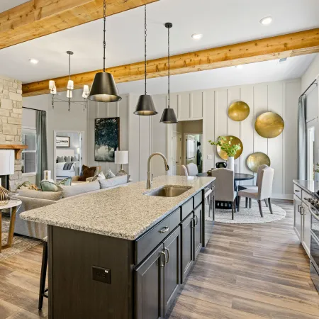 a kitchen with a marble island