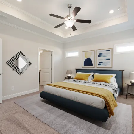 a bedroom with a bed and a fan