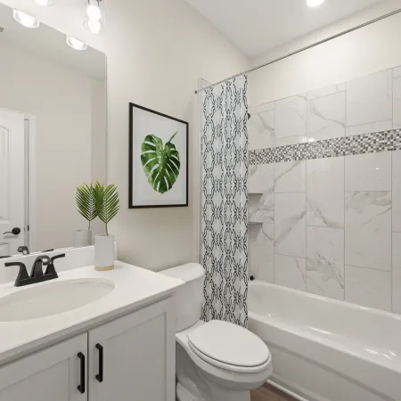 a bathroom with a shower and sink