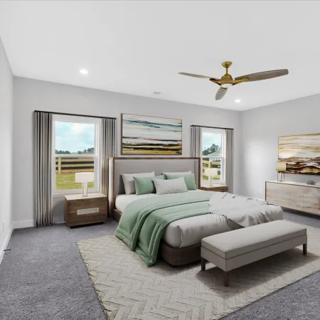 Modern bedroom with gray carpet, green bedding, bench, ceiling fan, and abstract wall art under natural light.