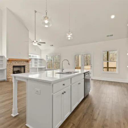 a kitchen with white cabinets