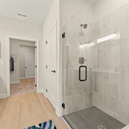 a bathroom with a glass shower