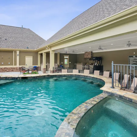 a swimming pool outside of a building