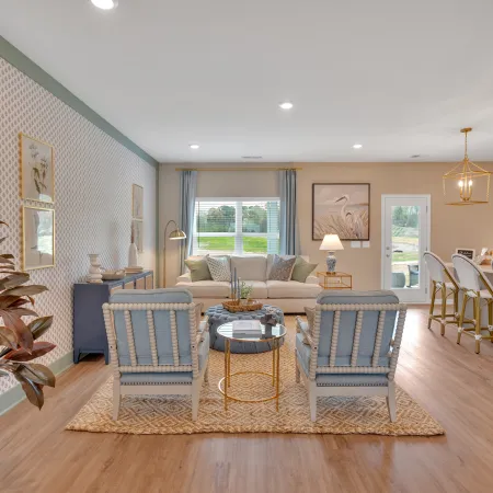 Stylish living room with a cozy sofa, elegant decor, and inviting lighting in a modern home setting.