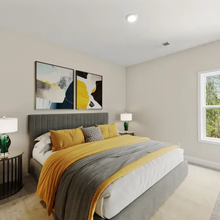 a bedroom with a bed and a plant