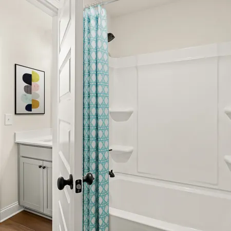 a bathroom with a bathtub sink and toilet