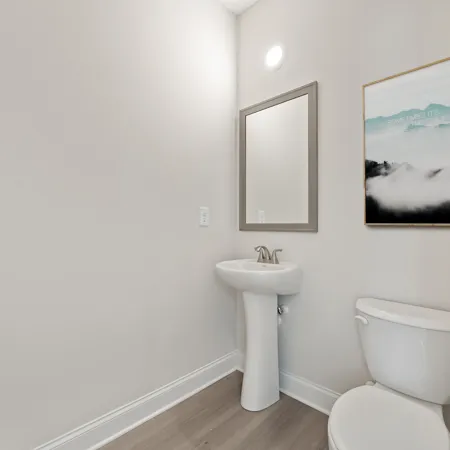 a bathroom with a sink and a toilet