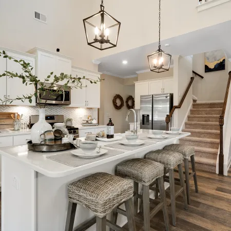 a kitchen with a dining room table