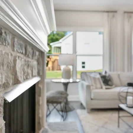 a room filled with furniture and a large window