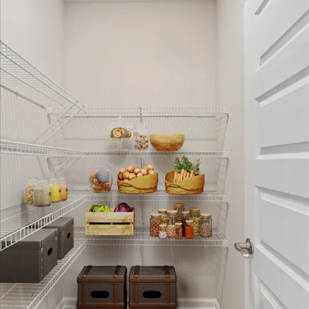 Organized pantry with wire shelves holding jars, baskets of vegetables, and storage boxes on a wood floor.