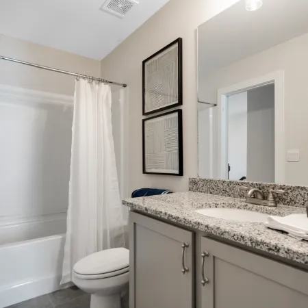 a kitchen with a sink and a mirror