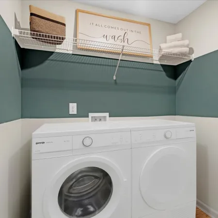 a washing machine in a room