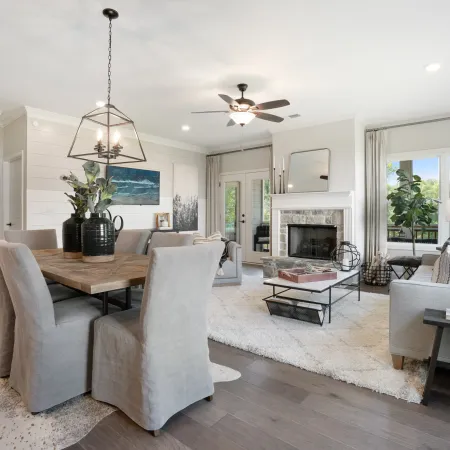 a living room filled with furniture and a fireplace