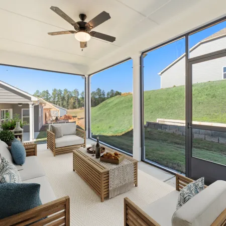 a living room with a large glass door