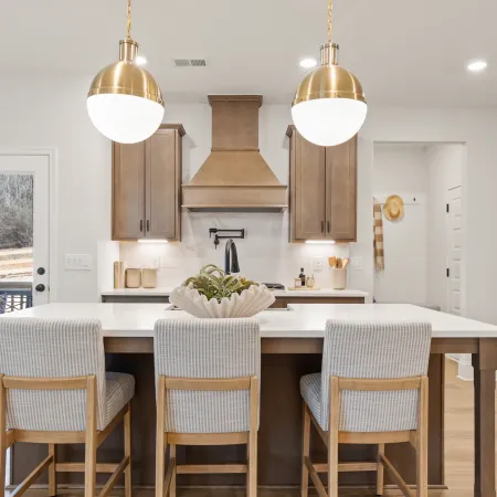 a kitchen with a dining table
