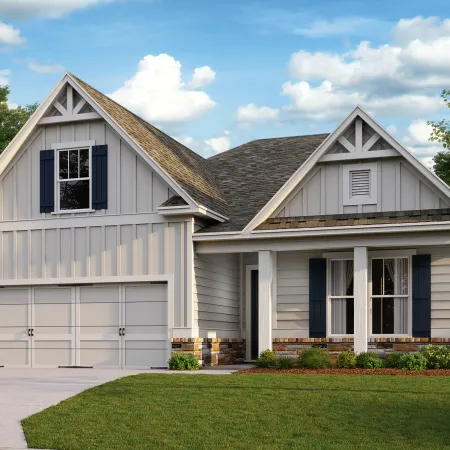 a white house with a garage with American Gothic House in the background