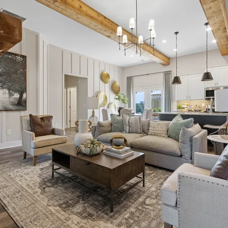 a living room with a wood ceiling