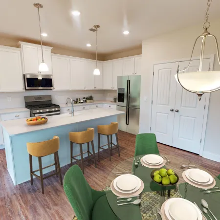 a kitchen with a dining room table