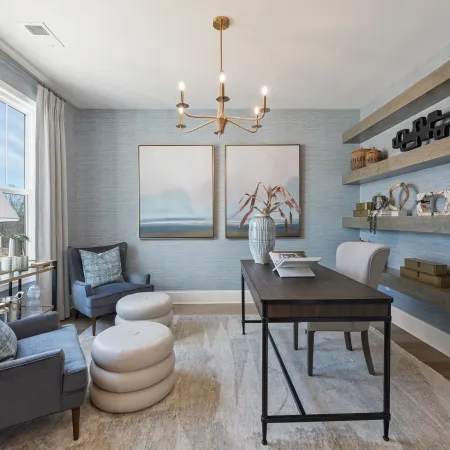a room with a table and chairs